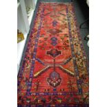 A Persian hand made Brojerd runner 294cm x 103cm