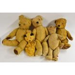 Stuffed Toys - 1940's and later, a gold plush musical clockwork Teddy Bear, centre seamed body,