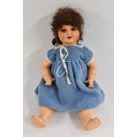 Armand Marseille - a 996 porcelain head doll, sleeping brown eyes, open mouth, brown curly hair,