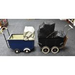 A Victorian/Edwardian coach built pram, black painted wooden body, folding hood,