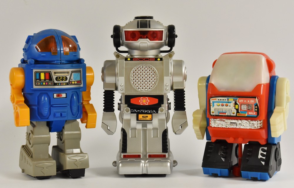 Robots - a retro New Bright Toys Morgan TR 2 battery operated bump and go robot,