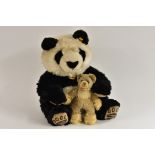 Steiff - a vintage creamy white bear, pale brown eyes, open mouth, fluffy paws, white chest panel,