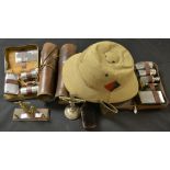 Militaria - a Boer War type pith helmet; a pair of leather gaiters; two travelling alter crucifixes;