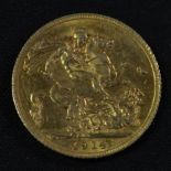 Coins - a George V gold sovereign,