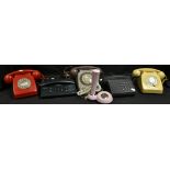 Telephones - a retro red dial cradle phone; others, grey, yellow,