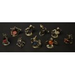 A set of nine novelty silver plated miniature animal pin cushions, as a musical band approx 3.