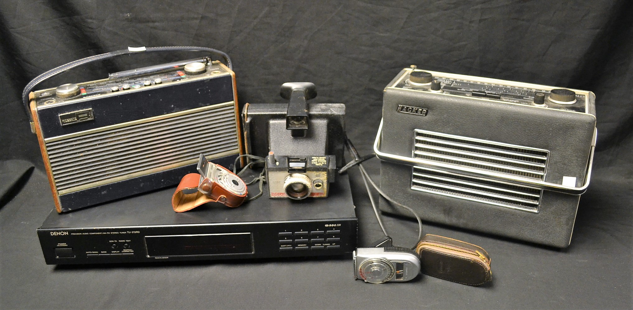 A Denon stereo tuner TU-215RD; a Hacker VHF Herald radio; a Roberts R600 radio;