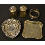 Silver - a pair of tapering octagonal pepperettes, Sheffield; a trinket tray, pierced bowl,