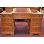 A Victorian oak Dickens desk,