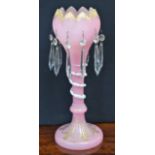 A Victorian pink and gilt glass lustre,