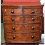 A Victorian mahogany bow fronted chest of two short over three long graduated cockbeaded drawers,