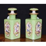A pair of 19th century Continental porcelain canted square scent bottles,