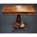 A William IV rosewood rounded rectangular tea table, possibly Irish, folding top with moulded edge,