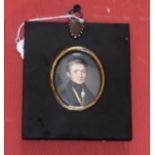 English School (19th century), a portrait miniature, of a young gentleman wearing a blue coat,