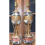 A pair of Empire design marble and gilt metal urnular table lamps,