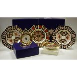 A Royal Crown Derby 1128 octagonal plate; two 2451 pattern octagonal plates;