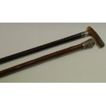 A silver mounted walking cane;