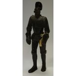 An early 20th century novelty table lighter in the form of a knight