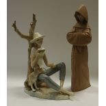 A Lladro figure of a monk;