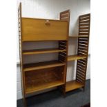 A mid 20th century Ladderax shelves,