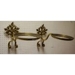 A pair of brass wall sconces for oil lamps