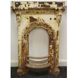 A late Victorian cast iron bedroom fire surround