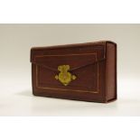 A 19th century French tooled and gilt leather rectangular necessaire,