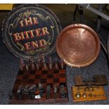 A set of postage scales; chess set; Dickens brass plates;