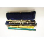 A cased clarinet Sisteme Buffet; a child's recorder;