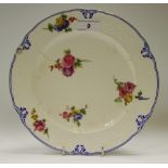 A French Sevres shaped circular plate, painted with roses and blue bells,