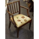 A George III open armchair, reeded back and arms, drop in seat,