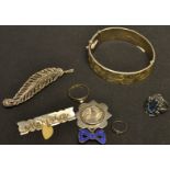 Jewellery - a silver bangle; a marcasite brooch; rings;