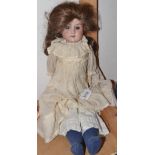 An Armand Marseille Florodora shoulder head doll, sleeping grey eyes, open mouth,