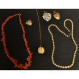 Jewellery - a coral necklace; a heart shaped locket; another, similar; pearl necklace,