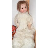 An Armand Marseille large bisque head socket doll, No 990 / 12 , sleeping brown eyes, open mouth,