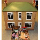 A mid 20th century scratch built two storey doll's house, Georgian style, battery operated lighting,