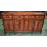 A reproduction mahogany break-centre sideboard,