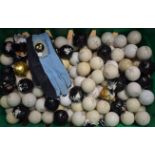 A quantity of vintage golf balls, some unused and wrapped, including Dunlop 65, Uniroyal Plus 6,