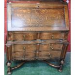 An early 20th century oak bureau,