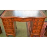 A reproduction mahogany writing desk,