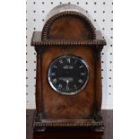 A Jaeger Chronos Works car clock, mounted in a domed mahogany case, as a mantel clock, 24.