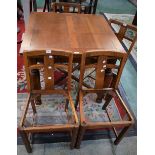 A light oak drawleaf dining table;