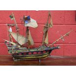 A model galleon on stand, approx 75cm wide, 55.