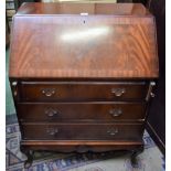 A 20th century mahogany bureau,