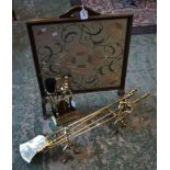 A brass three piece companion set; a pair of andirons; firescreen;