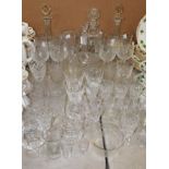 Glassware - an Edwardian cut glass decanter; another similar;