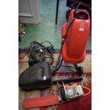 Tools - a Stihl O45AV chainsaw; another,