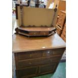 A 20th century oak dressing table, bobbin turned supports above two small drawers,