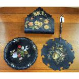 A Victorian paper mache firescreen fan, painted and applied with flowers, turned handle; another,