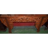 A Chinese hardwood rectangular altar table, flush top above a deep frieze,
